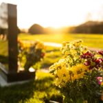 Dusk,At,A,Winter's,English,Cemetery,Seen,With,In-focus,Flowers